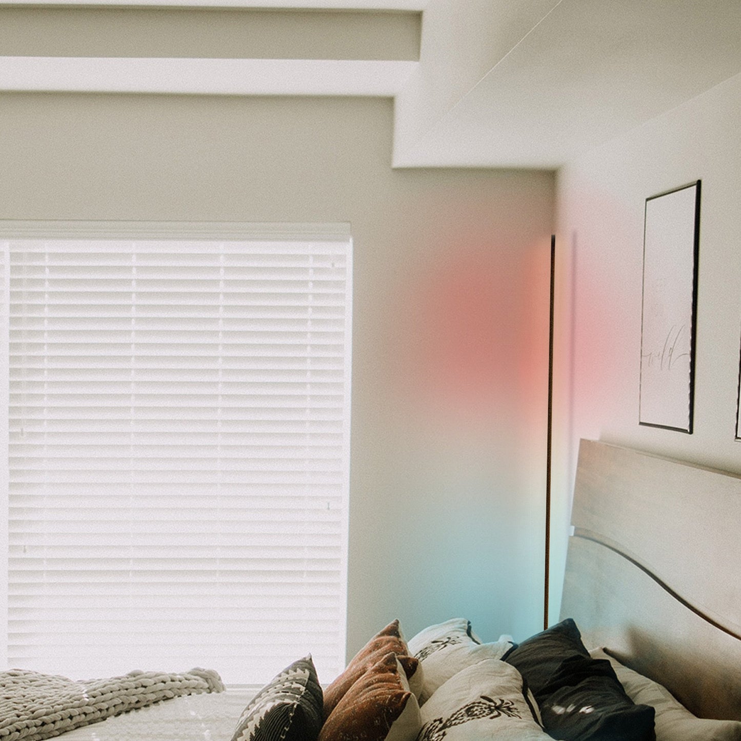 Minimalist Corner RGB floor lamp, lit with blue, white, and red lights, gently illuminating corner of a sunny bedroom.