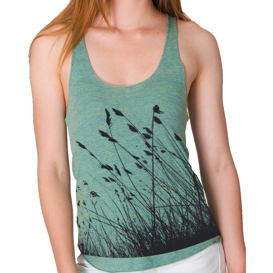 Woman wearing lemon green Through The Tall Grass Ladies Tank top, with black printed graphic of tall grass.